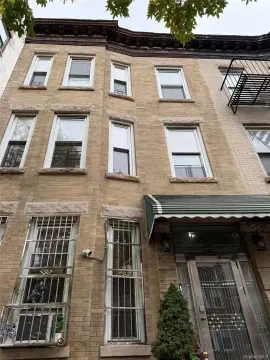 Brick Triplex with Backyard
