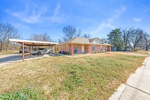 Brick Duplex with Covered Carports