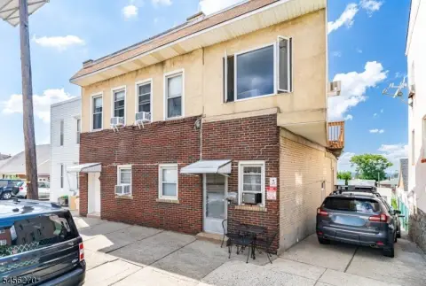 Triplex with Three-Car Garage