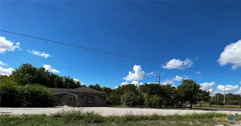 Commercial Land with Existing Home