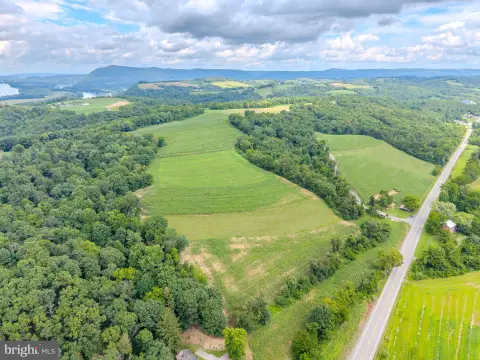 Agricultural Land with Farmhouse