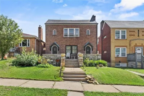 Brick Duplex with Stained Glass