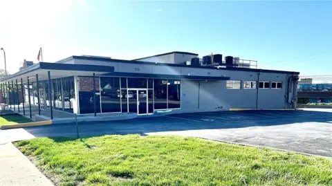 Renovated Two-Story Corner Commercial Building