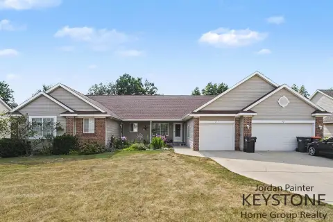 Well-Maintained Duplex with Attached Garages