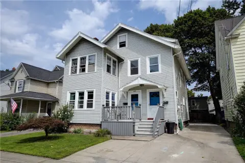 Two-Unit Duplex with Sunrooms