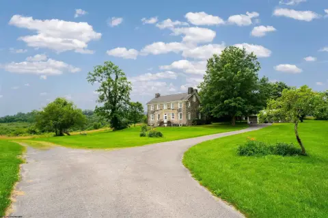 Historic Colonial Farmhouse on Large Acreage