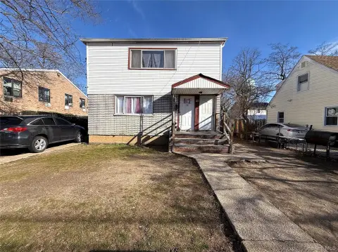 Six-Bedroom Legal Two-Family Home