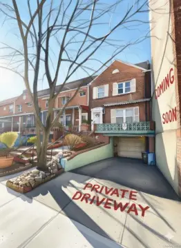 Woodside Two-Family Home with Driveway