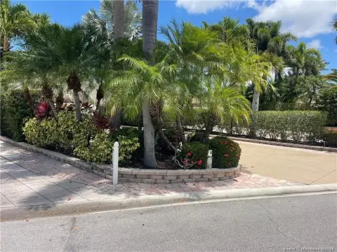 Landscaped Oasis with Tiki