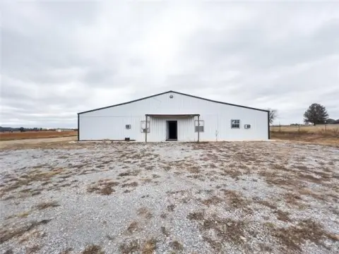 Versatile Land with Two Buildings