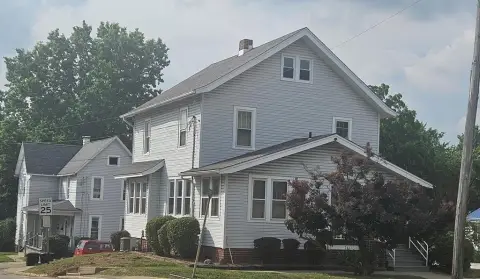 Well-Maintained Duplex with Commercial Potential