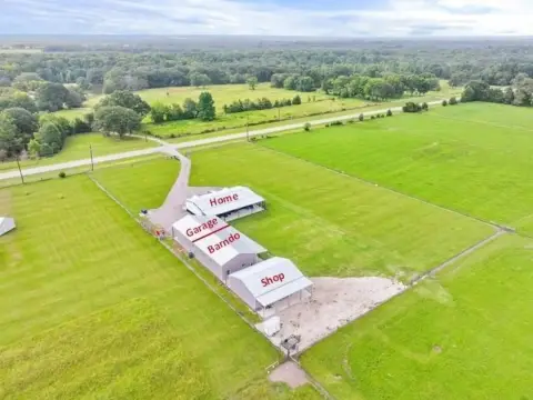 16-Acre Farmhouse Estate with Family Center