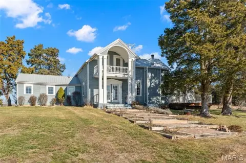 Picturesque Farmhouse on Sprawling Acreage