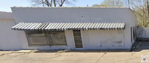 Fenced Storefront Property