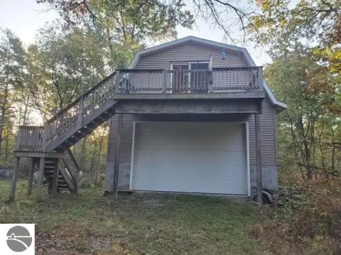 Wooded Land with Garage/Building