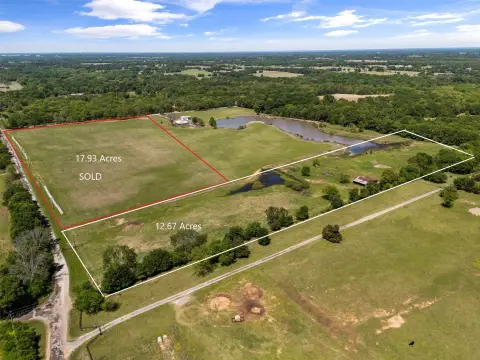 Wooded Agricultural Land with Pond