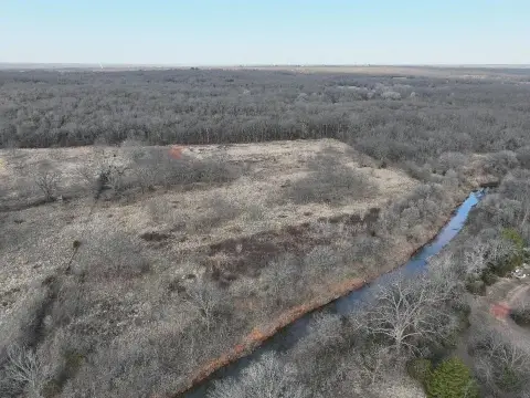 Land with Creek and Pond