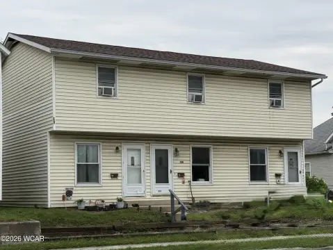 Triplex With Storage Building