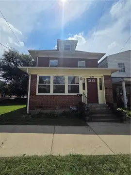 Brick Duplex with Detached Garages