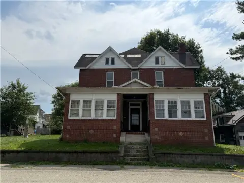 Brick Triplex on Double Lot
