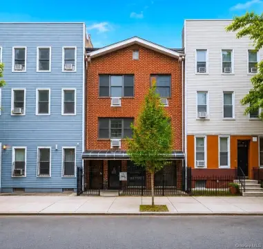 Brick Triplex With Finished Basement
