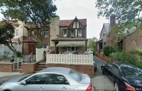 Semi-Attached Two-Family Home with Detached Garage