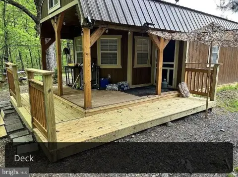 Land with Mountain Stream, Cabins