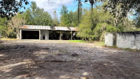 Commercial Land with Existing Improvement