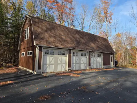 Spacious Garage with Paved Parking