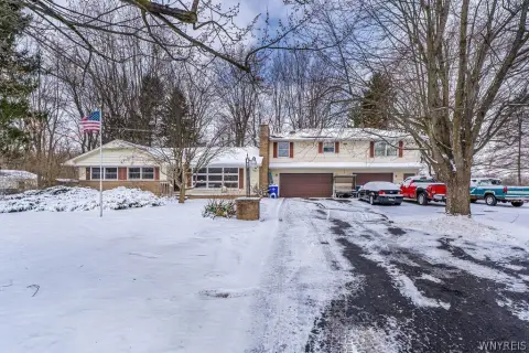 Well-Maintained Two-Family Home on Acreage