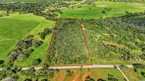 Subdivided Acreage with Small Pond