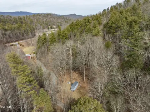 Unrestricted Mountain Land Near Lake