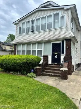 Income-Producing Duplex with Vacant Lot