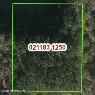 Vacant Lot with Pond View