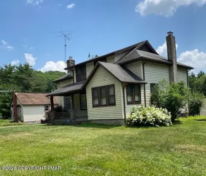 Multifamily Property with Outbuildings
