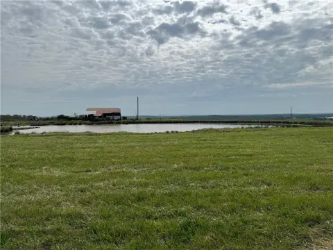 15 Acres Land with Pond