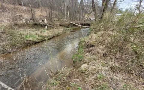 Unrestricted Acreage with Creek Frontage