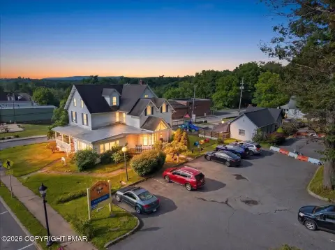 Commercial Land with Existing Buildings