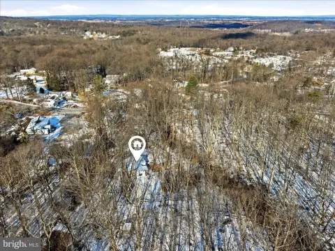 Secluded Wooded Acreage with Cabins