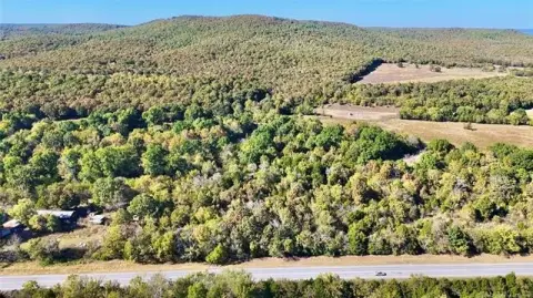 Highway Frontage Wooded Land