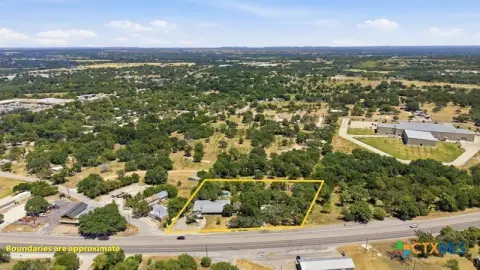 Commercial Land With Existing Improvements