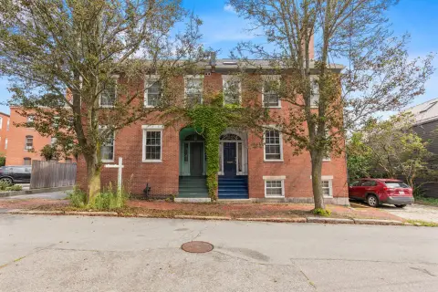 Brick Triplex with Deck