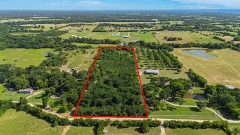 Secluded Land with Pond and Trees