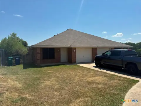 Brick Duplex on Fenced Lot