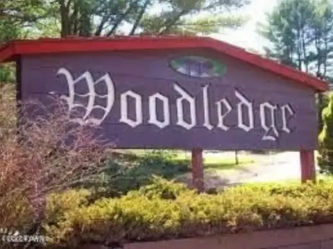 Wooded Lot in Woodledge Community