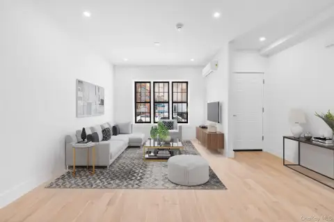 Renovated Two-Family Townhouse with Parking
