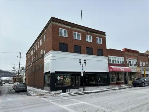 Mixed-Use Building with 4 Apartments