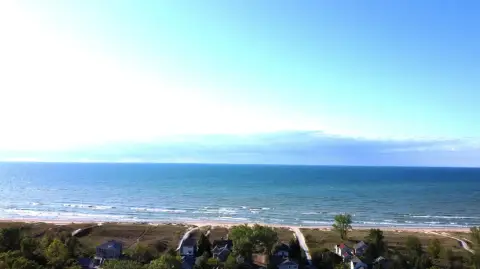 Lake Michigan Land with Sunset Views