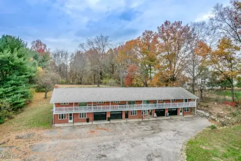 Updated Quadplex on 2.5 Acres
