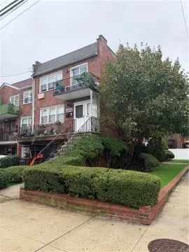 Brick Triplex with Fenced Yard
